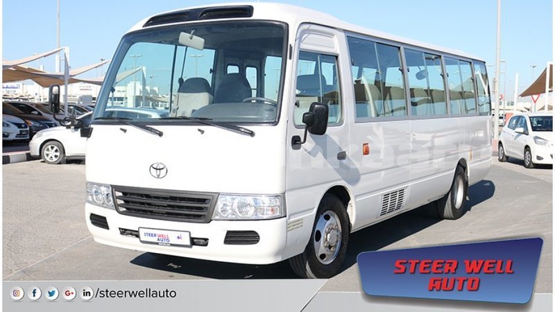 Big with watermark toyota coaster baa import dubai 1616