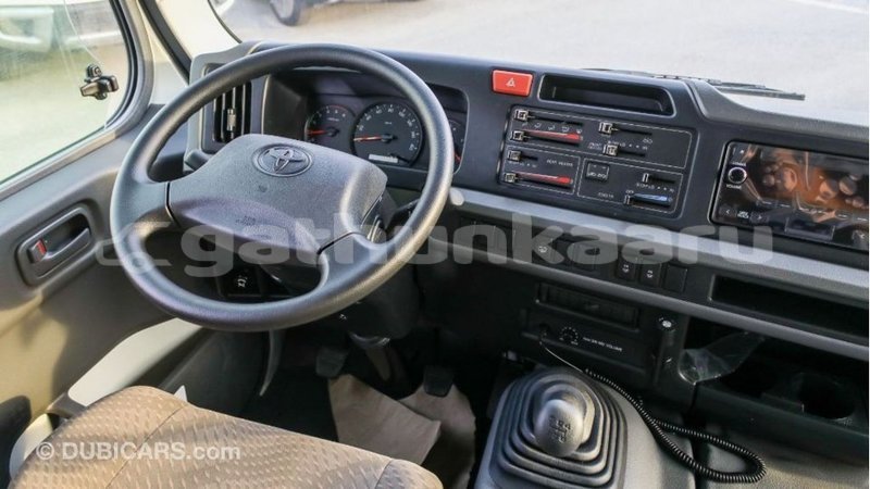 Big with watermark toyota coaster baa import dubai 2113