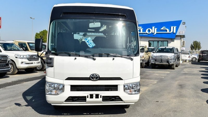 Big with watermark toyota coaster baa import dubai 2944