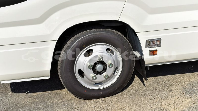 Big with watermark toyota coaster baa import dubai 2944