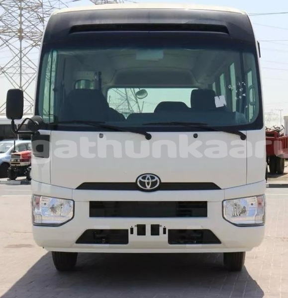 Big with watermark toyota coaster baa dharavandhoo 4128