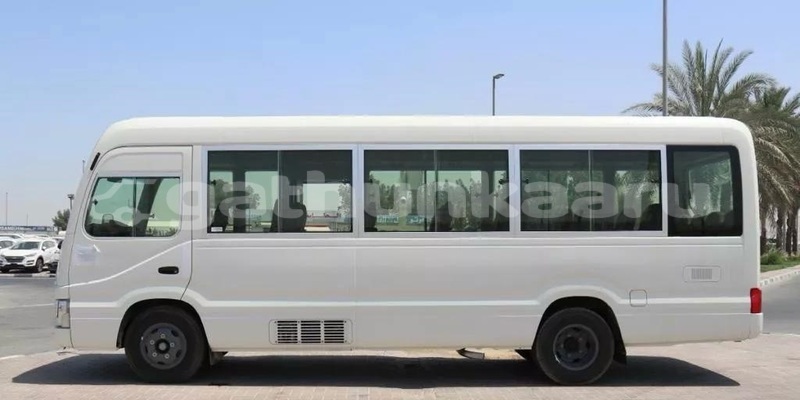 Big with watermark toyota coaster baa dharavandhoo 4128