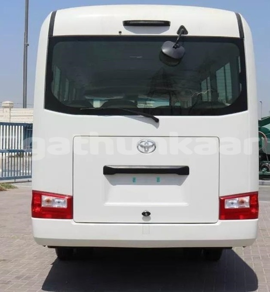 Big with watermark toyota coaster baa dharavandhoo 4128