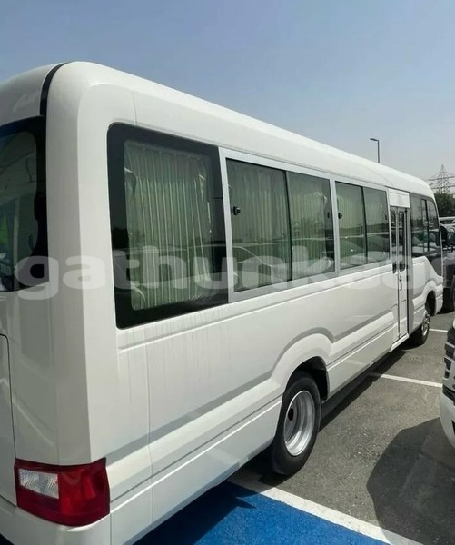 Big with watermark toyota coaster baa dharavandhoo 4128
