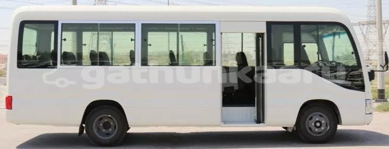 Big with watermark toyota coaster baa dharavandhoo 4128