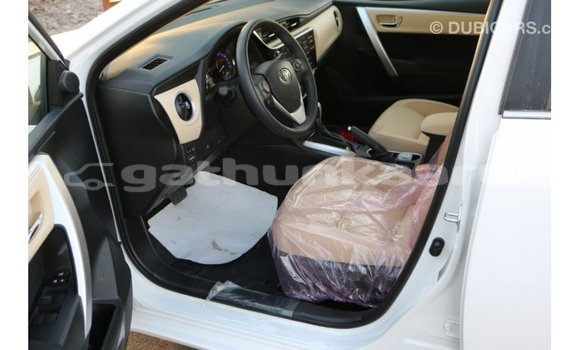 Buy Import Toyota Corolla White Car in Import - Dubai in Baa Buy Import Toyota Corolla White Car in Import - Dubai in Baa